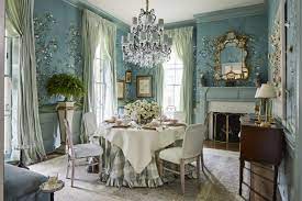 The kitchen opens to this spacious dining area. Nashville Show House Southern Living Becky Boyle Dining Room Gracie Wallpaper Handpainted Chinoiserie Hand Painted Blue Bamboo Cowtan Tout Blue White Buffalo Check Table Skirt Ruffled Crystal Chandelier Swans Of Fifth Avenue