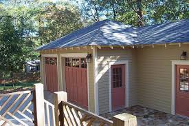 Here is a garage exterior design in brick and wood. Custom Garage Construction Building A Detached Garage To Replace A Carport