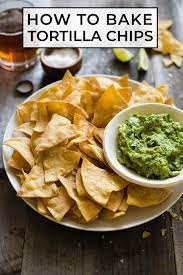 How To Make Baked Tortilla Chips Recipe Baked Tortilla Chips Tortilla Chips Healthy Chips