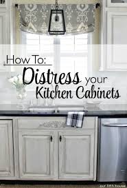 It's all right to apply the glaze liberally in these places because some of it will be removed in the next step of the process. Distressed Kitchen Cabinets How To Distress Your Kitchen Cabinets Our Fifth House Distressed Kitchen Cabinets Distressed Cabinets Painting Kitchen Cabinets White