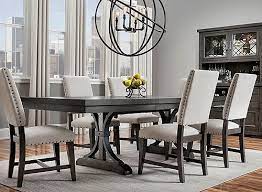 This set includes table and 4 stools. When It Comes To The Halloway 7 Piece Dining Set Strong Lines And Eye Catching Detail Create Dining Sets Modern Dining Room Table Decor Dining Room Furniture