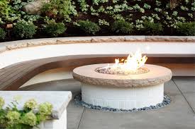 This is where your fire will be. Fire Pit And Floating Bench In Backyard Hgtv