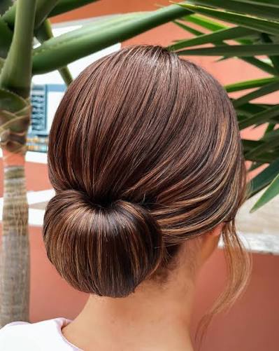 Sleek & Smooth 💫 Chignon style updo, keeping it classic and simplistic! 2023 ⭐️ will see a huge shift to more sleeker hairstyle requests. They bring an effortless glamour to any look. #