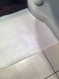 This 50 Temporary Flooring Floats Right Over Rental Bathroom Tile Rental Bathroom Vinyl Flooring Bathroom Bathroom Flooring Options