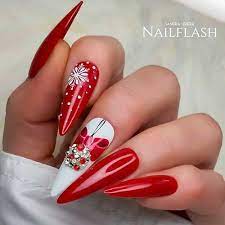 The flower is largely thought to symbolize rising above the temptations of life, and becoming a better person. The Cutest And Festive Christmas Nail Designs For Celebration Red Christmas Nails Christmas Nail Designs Christmas Nails