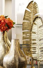 Gold Home Decor In 2020 Showroom Decor Gold Living Room Decor Gold Home Decor