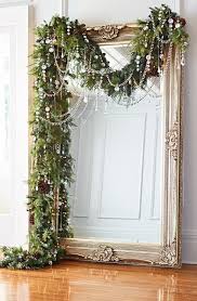 Flocked wreaths and garland adorn windows and doorways, providing just enough contrast against the white backdrop of the house. Pin By Paulina Kuri On Feel Betta With Lametta White Christmas Decor Beautiful Christmas Christmas Diy