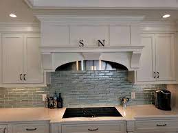 The kitchen backsplash is placed on the kitchen wall between the countertops and the wall cabinets. Glass Tiles Mosaics For Kitchen Backsplash Floors And Walls