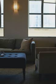 Maybe you would like to learn more about one of these? Brown Couch Beside White Wall Photo Free Furniture Image On Unsplash
