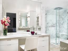 With traditional wall mounted basins, you get all the sink without a bulky vanity swallowing up space. Modern White Bathroom With Makeup Vanity Luxe Interiors Design