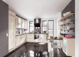 An amazing kitchen with a rolling ladder to access high cabinets as well as a stunning 10 by 4 foot carrara marble topped island! 15 Lovely Built In Kitchen Tables Home Design Lover