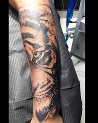 My calvin & hobbes tattoo by drew blood at crooked crows (satx). Updated 38 Fierce Tiger Eyes Tattoo Designs August 2020