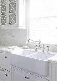 Farmhouse sinks are beautiful, spacious, and timeless, plus they add a distinctive look to any kitchen they're placed in. 5 Tips For Your Kitchen Redesign Creating Celebrity Style Modern Kitchen Interior White Farmhouse Sink Modern Kitchen Interiors Kitchen Redesign