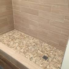 Do you think tan tile bathroom ideas looks nice? Sliced Java Tan Pebble Tile Pebble Tile Shop