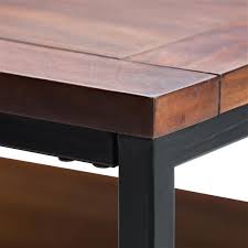 The console table can be used on most occasions, like the entryway, living room, bedroom, hallway, etc. Simpli Home Skyler 34 In X 34 In X 18 In With Black Metal Legs And Dark Cognac Brown Solid Mango Wood Top Square Coffee Table 3axcsky 02 Rona