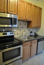 12 ways to revamp your kitchen cabinets for the ultimate makeover 20 kitchen wallpaper ideas you'll love way more than tile The Cheapskate S Guide To Kitchen Renovations Rental Income Report Afford Anything