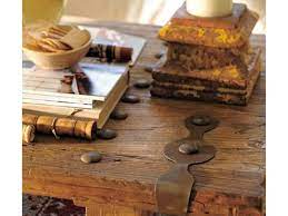This dark wood effect coffee table with khaki glass and chrome legs would make an excellent addition in any modern or contemporary home. Pottery Barn Hastings Reclaimed Wood Coffee Table Apartment Therapy S Bazaar