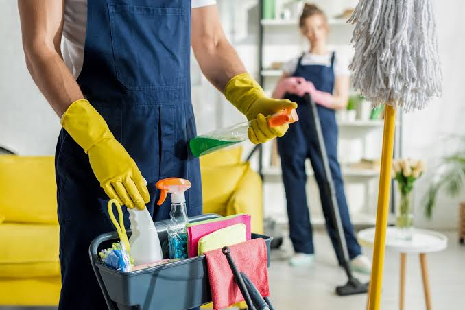 Apartment cleaning services by Neat Nest Cleaning Co, featuring a freshly cleaned bedroom with neatly arranged linens and dust-free furniture.