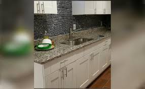 Granite, unlike quartzite, is an igneous stone. Granite Counters White Cabinets Stone Cabinets