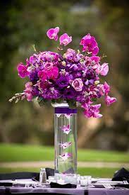 Fuchsia And Purple Tall Centerpiece Purple Centerpieces Purple Wedding Bouquets Wedding Bouquets Purple Orchids