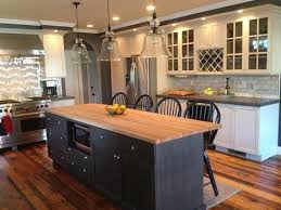 White Cabinets With Dark Grey Quartz Counter Dark Grey Or Black Island With Butcher Bloc Black Kitchen Island Butcher Block Island Kitchen Grey Kitchen Island