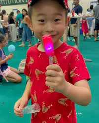 St. Joseph Institution International Christmas Fair! Great family weekend!  Alexander and his winner winner chicken dinner big prize! :)