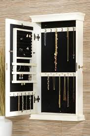 Check out our wall mounted jewelry cabinet selection for the very best in unique or custom, handmade pieces from our storage & organization shops. Wall Mount Jewelry Armoires Eliza Antique Jewelry Armoire White Wall Mounted Jewelry Armoire Jewelry Cabinet Jewelry Mirror