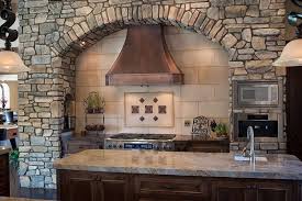 A wooden farmhouse kitchen vent hood can be the centerpiece of your kitchen, build it using these free plans and leave it natural or paint it to match your kitchen. Duluth Farmhouse Style Stove Hood Soft Hammered Texture Copper Hoods