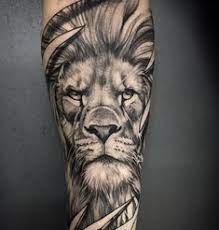 Lion Tattoos Hold Different Meanings Lions Are Known To Be Proud And Courageous Creatures So If You Feel That Yo Lion Head Tattoos Lion Tattoo Animal Tattoos