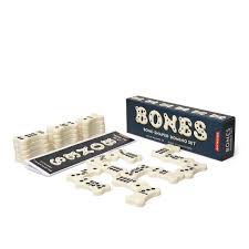 In this case, player one on the left is forced to play their double six. Bones Domino Set Kikkerland Design Inc