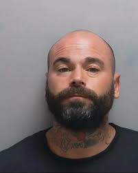 Three men jailed for raiding Gosport home with weapons as young children  cowered inside