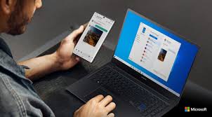 The your phone app already lets android users view notifications, texts and files on their windows 10 pc, but many android devices can now run apps and mirror the device's screen directly to your pc's desktop. Microsoft Adds Wireless File Transfers To Your Phone App