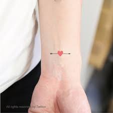 This is a commonly seen design. Arrow Heart 2 Pcs Temporary Tattoo From Tatitooetsy On Etsy