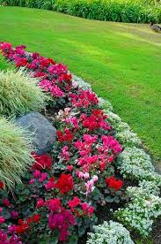 Yellow and blue are complementary colors, so. Flower Bed Ideas For Full Sun Pictures Beautiful Gardens Flower Bed Borders Planting Flowers