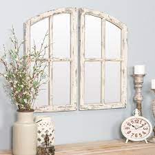 The distressed finish adds rustic charm and a modern farmhouse element to your space. Jolene Arched Window Pane Mirrors Set Of 2 Overstock 20112739