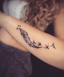 Female Bird Tattoos On Arm Eye Catching Feather And Birds Arm Tattoos For Girls Girl Arm Tattoos Tattoos Tattoo Models