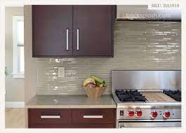 If you like the pattern of the subway tile but are looking for a bit more oomph, draw inspiration from this beautiful jungalow style kitchen. Light Brown Color Glass Brick Mosaic Tile Backsplash Com Kitchen Backsplash Trends Contemporary Kitchen Kitchen Backsplash Designs