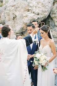 Stefana Ritual At A Greek Orthodox Wedding Crete For Love Orthodox Wedding Greek Wedding Traditions Greek Wedding Dresses