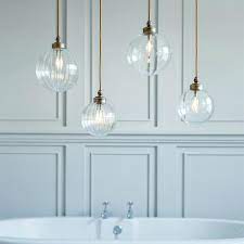 Whether you're looking for a low hanging chandelier, an intricately designed pendant your bathroom might also benefit from bright, clinical lighting for shaving or applying makeup in the morning. Bathroom Pendant Lights Mad About The House