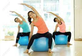 This would allow you to work under the direction of the pro sports team, sports gym, yoga studio, or hospital to provide optimal health care to improve a. Group Of Young Women Stretching Body On Yoga Balls In Studio Practice Class Wellness Well Being Healthy Lifestyle Stock Photo Picture And Royalty Free Image Image 84916750