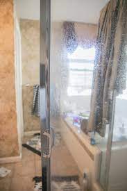 Although it is not particularly harmful to your health, it can cause damage to your shower wall, door and bathtub. How To Remove Hard Water Stains From Glass Shower Doors The Forked Spoon