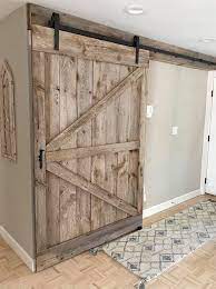 As door hangers, we have access to 100s of doors that can meet your visual requirements. Large Barn Door For Front Hallway Northshore Barn Doors Facebook