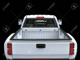 With strong engines built to work in all sorts of weather and terrain, pickup trucks provide the perfect ride to a camping spot or the optimal amount of storage for your surfboards or skis. White Pickup Truck Ruckansicht Lizenzfreie Fotos Bilder Und Stock Fotografie Image 75795121