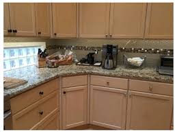 The natural wood grains and texture of the solid cherry wood cabinets, combined with black drawer and cabinet pulls, creates a more raw, industrial feel to the space, while keeping its elegant silhouette. Need Advice Nickel Or Bronze Knobs For Maple Kitchen Cabinets