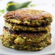 Zucchinipuffer Vegan Vegane Wunder Rezept In 2020 Zucchini Puffer Lebensmittel Essen Zucchini