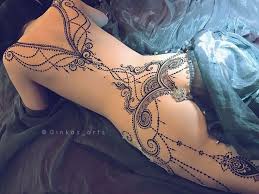 Because henna tattoos last one to two weeks after application, you may want to remove the stain early. Lower Back Henna Tattoos