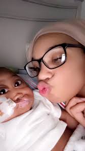 This is our sweet little guy, Elias. He's seven weeks old and was born with  a right hand limb difference (no middle finger, webbed “nubs” for the other  fingers). We had no