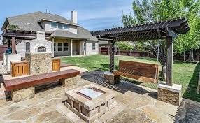 You'll want to ensure that it's a fairly open space, free and clear of overhanging obstacles like tree branches. Pergola With Fire Pit Backyard Designs Designing Idea