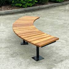 Over the years the squirrels have been gnawing at the legs and underneath. Fawkner Curved Timber Bench Seat Draffin Street Furniture