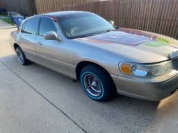 Image result for Charcoal Green 1999 Town Car